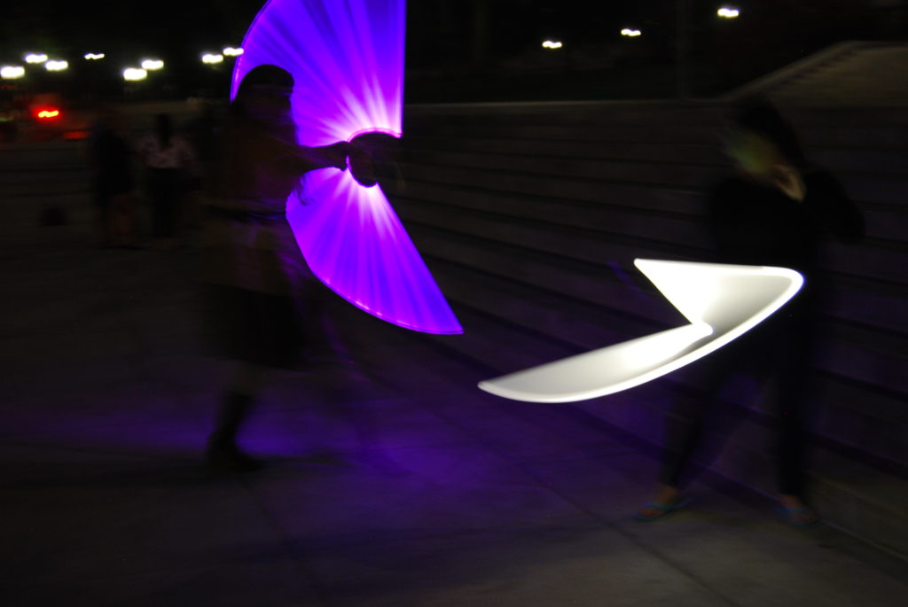 Glow left by swinging lightsabers on the Capital Steps in Harrisburg